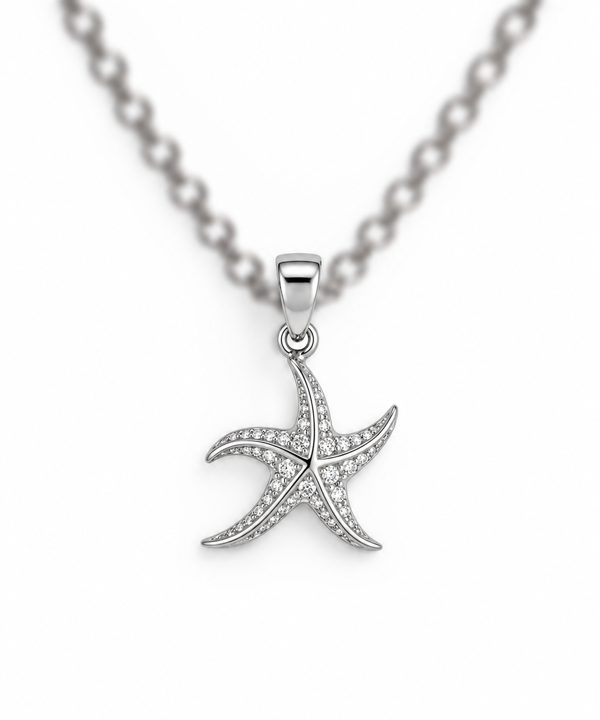 925 sterling silver starfish pendant with sparkling stones.