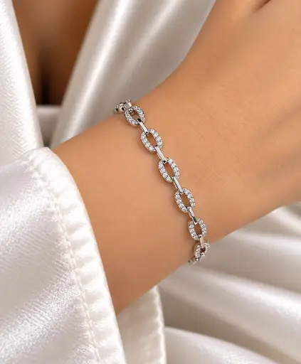 [BRC-009] 925 sterling silver bracelet with white stone-set oval links and straight connectors.